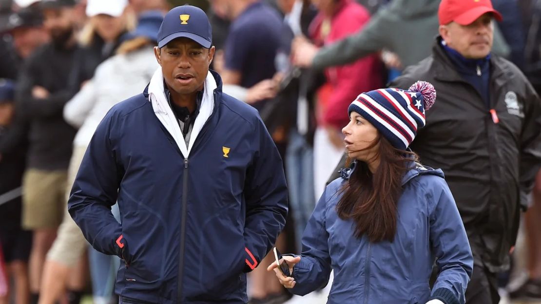 Tiger Woods y Erica Herman fotografiados durante el tercer día de la Presidents Cup, en Melbourne, el 14 de diciembre de 2019. Crédito: William West/AFP/Getty Images