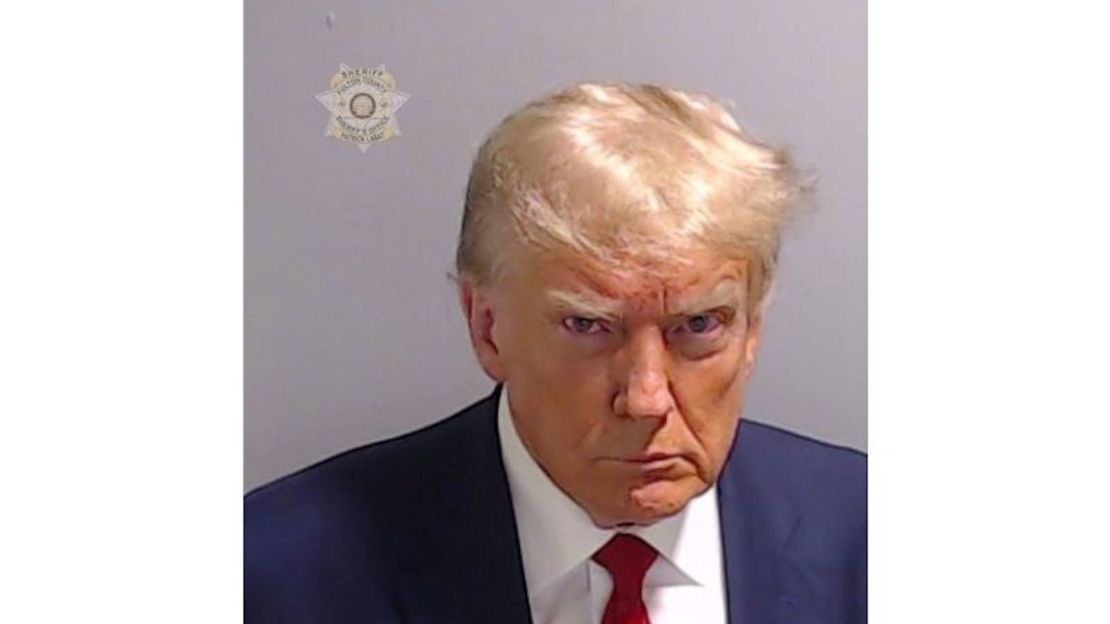 CNNE 1443616 - donald-trump-mugshot-082423-white-bars