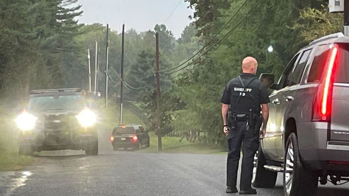 La Policía registra un área de interés en la propiedad de Longwood Gardens el jueves.