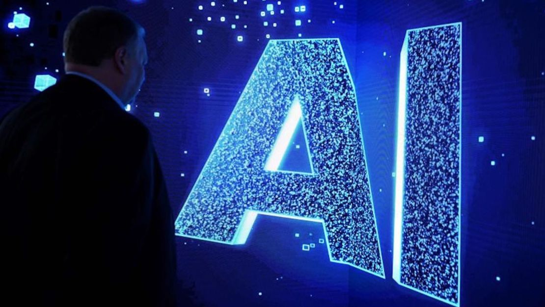 Un cartel con la leyenda "AI" en el evento de la industria de las telecomunicaciones Mobile World Congress 2023 en Barcelona, España.