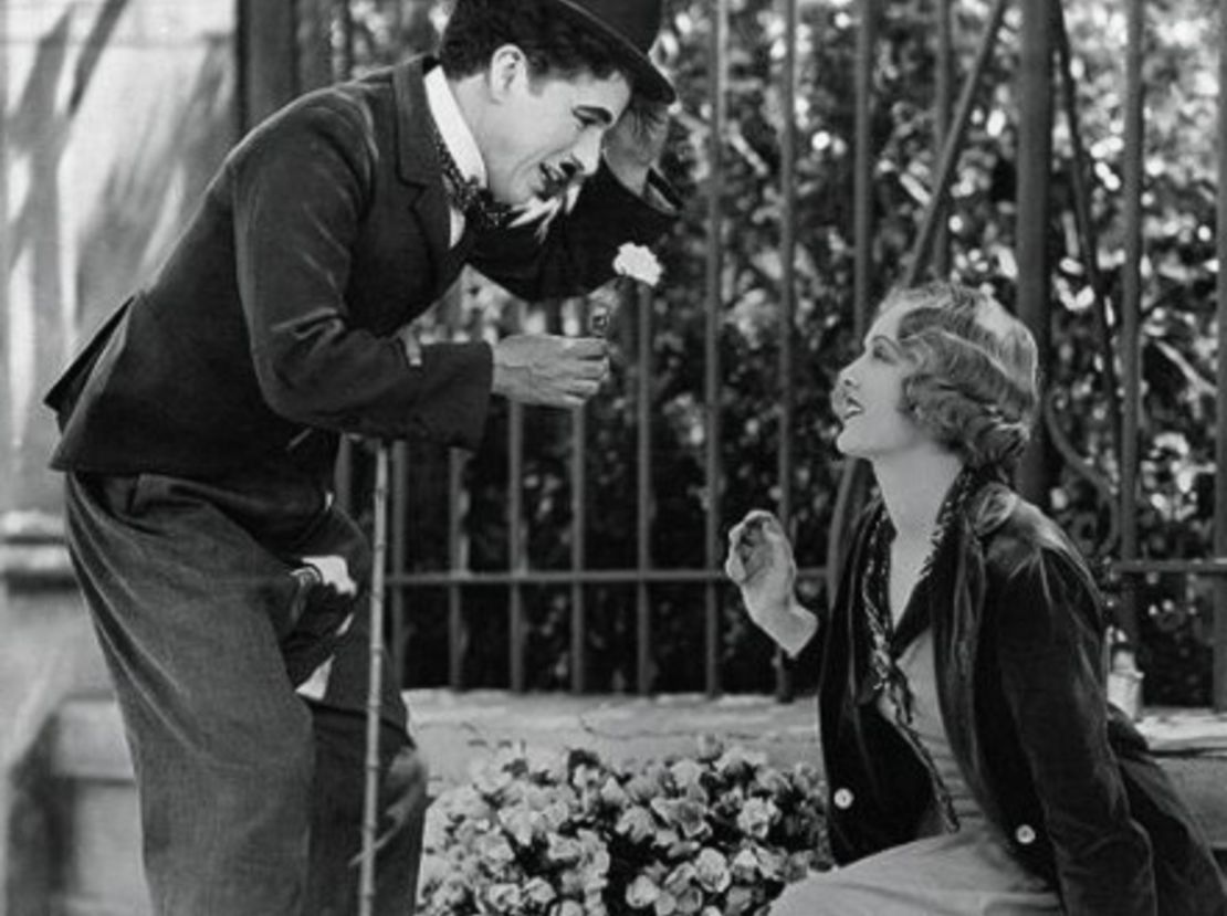 CNNE 152878 - image (1) 131204175045-city-lights-charlie-chaplin-flower-entertain-feature-jpg for post 106515