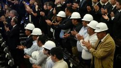 A group of the 33 miners rescued in 2010 attend the state funeral of late former President Sebastian Piñera at the National Congress Palace in Santiago on February 9, 2024. Former presidents and politicians of Chile, from left to right, as well as family and followers say goodbye this Friday to former President Sebastian Piñera, who died on Tuesday while piloting his helicopter in the south of the country. (Photo by Pablo VERA / AFP)