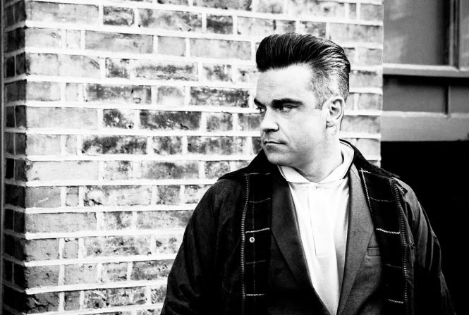 Robbie Williams | El exintegrante de 'Take That' y baladista pop Robbie Williams está entre las leyendas que ha posado para McDonnell.