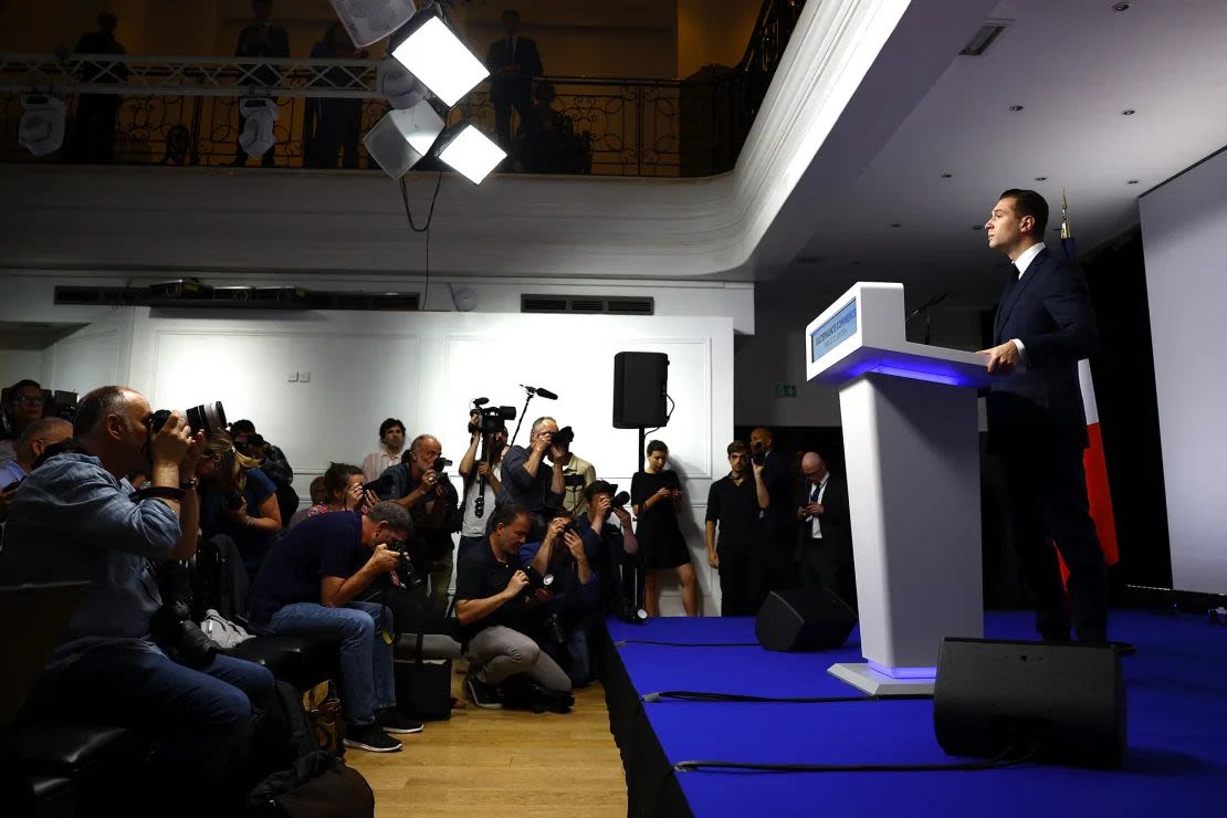 Jordan Bardella speaks at the RN headquarters in Paris after the first round of voting, June 30, 2024.