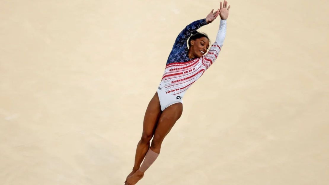 Biles competes on floor during the women's team final.