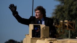 Argentina's President Javier Milei greets the crowd from an armoured tank during a military parade marking the 208th anniversary of the independence of Argentina from Spain in Buenos Aires on July 9, 2024. (Photo by ALESSIA MACCIONI / AFP)