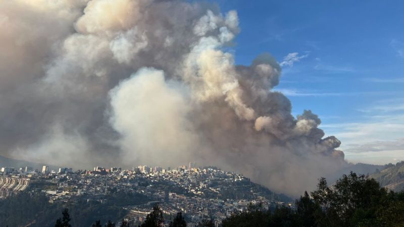 Major forest fire blankets Quito in smoke, emergency crews battle flames