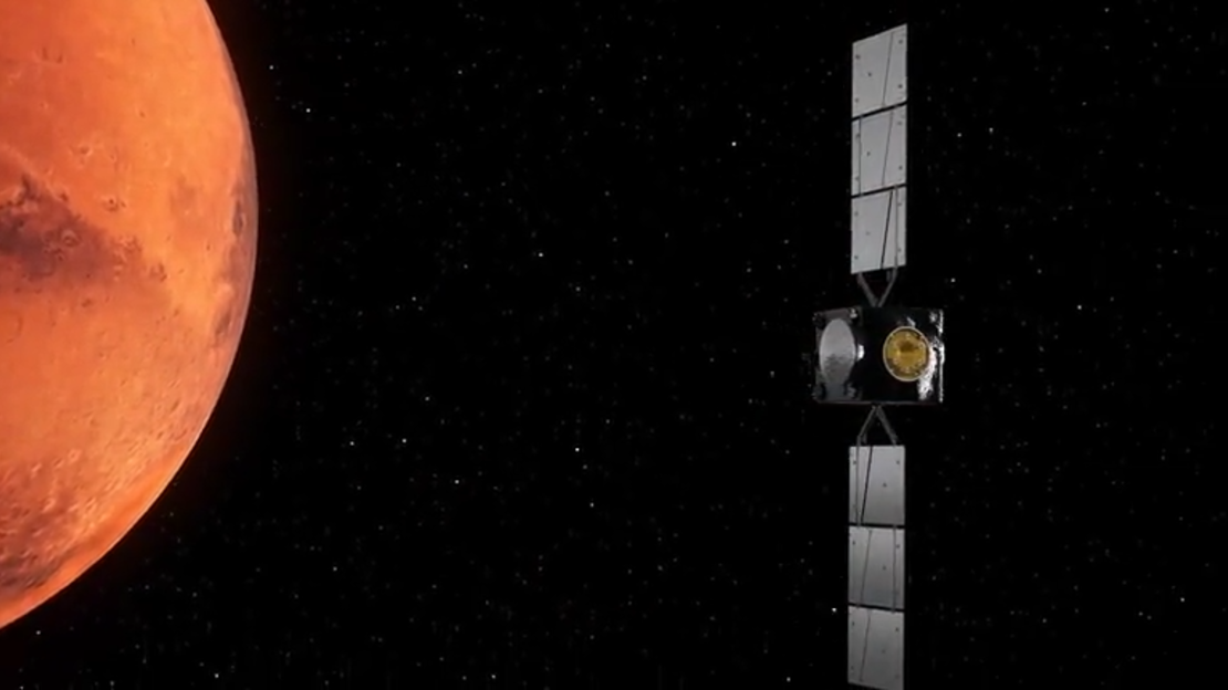 Hera will pass by Mars in mid-March 2025, giving the probe the boost needed to reach the Didymos system. An artistic rendering shows Hera passing by the red planet and conducting tests of its suite of 11 instruments on Mars and its moon Deimos. Credit: ESA.