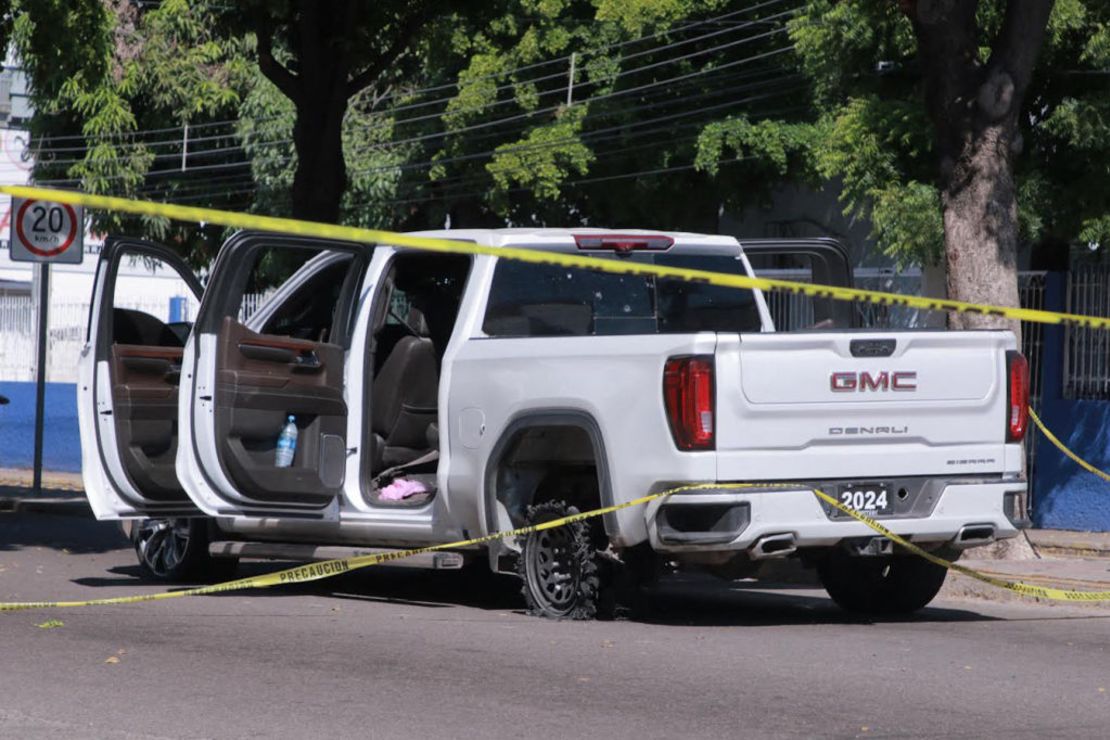 A van riddled with bullet holes is photographed at the crime scene after a shooting in Culiacán, Sinaloa state, Mexico, on September 9, 2024. Credit: IVAN MEDINA/AFP via Getty Images