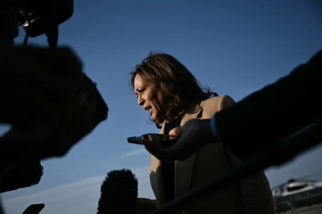 Vice President Kamala Harris speaks to reporters before boarding Air Force Two at Joint Base Andrews in Maryland on Oct. 12, 2024.