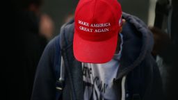 LONDON, ENGLAND - DECEMBER 05: A demonstrator wears a Make America Great Again hat during 'March for Freedom' anti-vaxx protest at Westfield shopping centre in Stratford on December 5, 2020 in London, England. London has been in Tier 2 Covid-19 lockdown restrictions since the nation-wide lockdown ended on December 2.