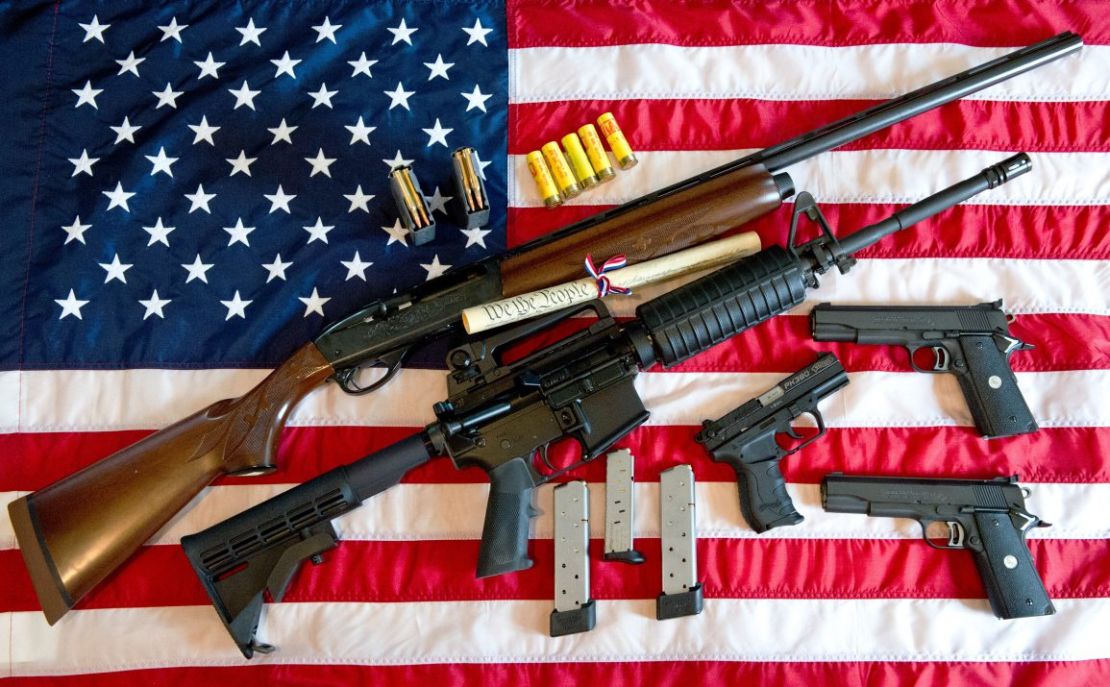 CNNE 215364 - 150107120403-aman-guns-american-flag