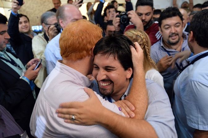 Miembros de la Mesa de la Unidad Democrática tras conocerse los resultados preliminares (LUIS ROBAYO/AFP/Getty Images).