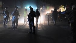 Afghan Crisis Response Unit (CRU) personnel stand guard at the site of bomb attack on the Spanish embassy compound in Kabul on December 11, 2015. Insurgents have launched an attack on a Spanish embassy compound in Kabul on December 11, Afghan officials said, following reports of gunfire and a massive car bomb in the centre of the city. AFP PHOTO / Wakil KohsarWAKIL KOHSAR/AFP/Getty Image