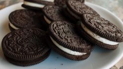 A March 7, 2012 photo shows a plate of Oreo cookies in Washington, DC.  Technically they're "chocolate sandwich cookies," a baked concoction of sugar, vitamin-enriched flour, canola oil, high-fructose corn syrup and, at the bottom of the list of ingredients, chocolate. But the Oreo cookie -- first baked in New York city 100 years ago on March 6, 2012 -- is much more than that. It's an American icon, the best-selling cookie in the nation, with plenty of fans around the world to boot. AFP PHOTO/Mandel NGAN