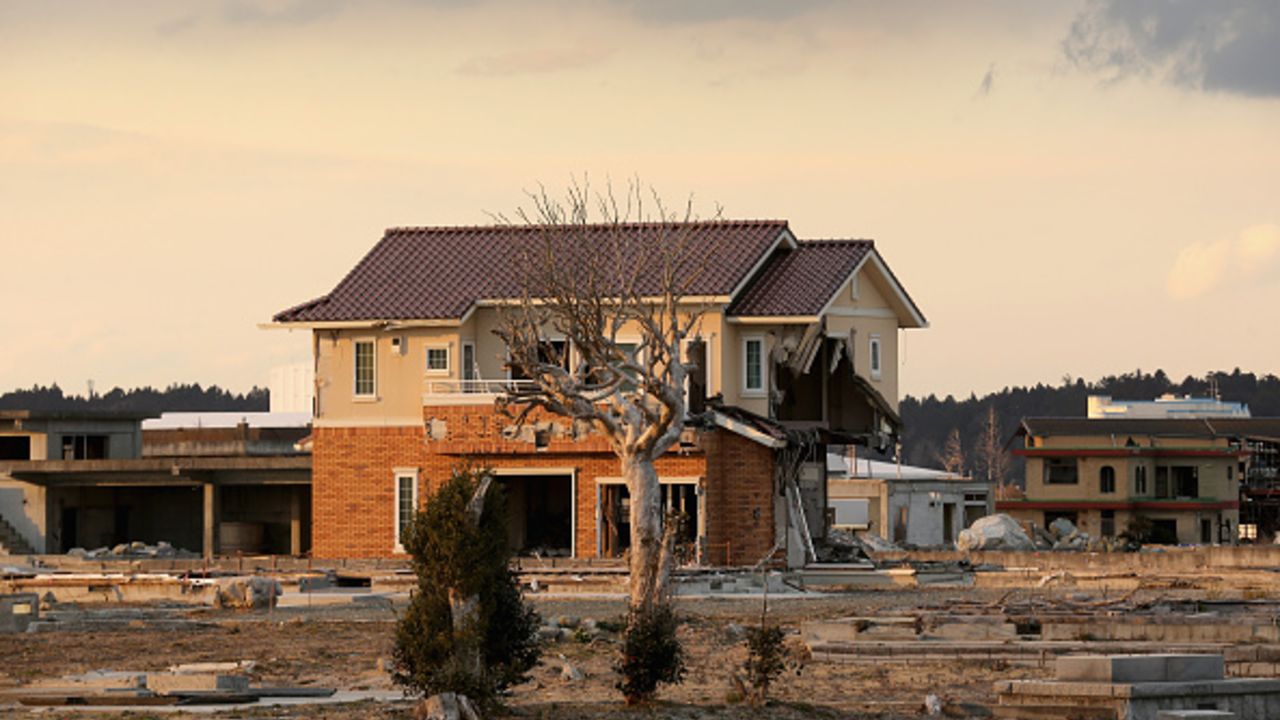 NAMIE, JAPAN - FEBRUARY 26:  A lone house sits on the scarred landscape, inside the exclusion zone, close to the devastated Fukushima Daiichi Nuclear Power Plant on February 26, 2016 in Namie, Fukushima Japan. The area is now closed to residents due radiation contamination from the Fukishima nuclear disaster. March 11, 2016 marks the fifth anniversary of the magnitude 9.0 earthquake and tsunami which claimed the lives of 15,894, and the subsequent damage to the reactors at TEPCO's Fukushima Daiichi Nuclear Power Plant causing the nuclear disaster which still forces 99,750 people to live as evacuees away from contaminated areas.