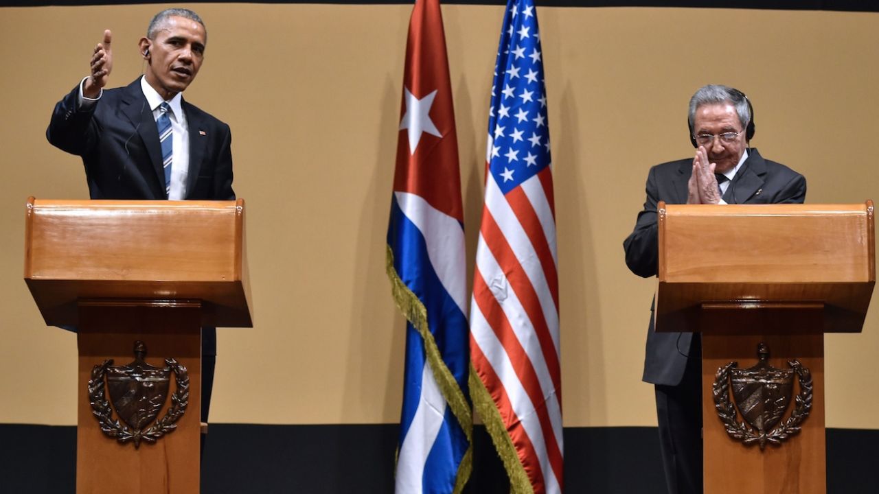 US President Barack Obama (L) and Cuban President Raul Castro give a joint press conference at the Revolution Palace in Havana on March 21, 2016. Cuba's Communist President Raul Castro on Monday stood next to Barack Obama and hailed his opposition to a long-standing economic "blockade," but said it would need to end before ties are fully normalized.   AFP PHOTO/Nicholas KAMM / AFP / NICHOLAS KAMM