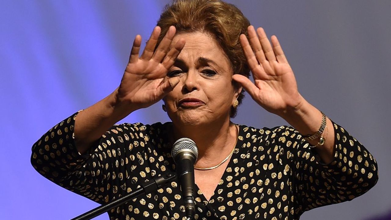 Brazilian President Dilma Rousseff gestures  during the opening ceremony of the 4th National Policy Conference on Women in Brasilia on May 10, 2016.
Brazilian President Dilma Rousseff launched a last-minute bid Tuesday to block impeachment proceedings against her in what could be her final hours in power. / AFP / EVARISTO SA