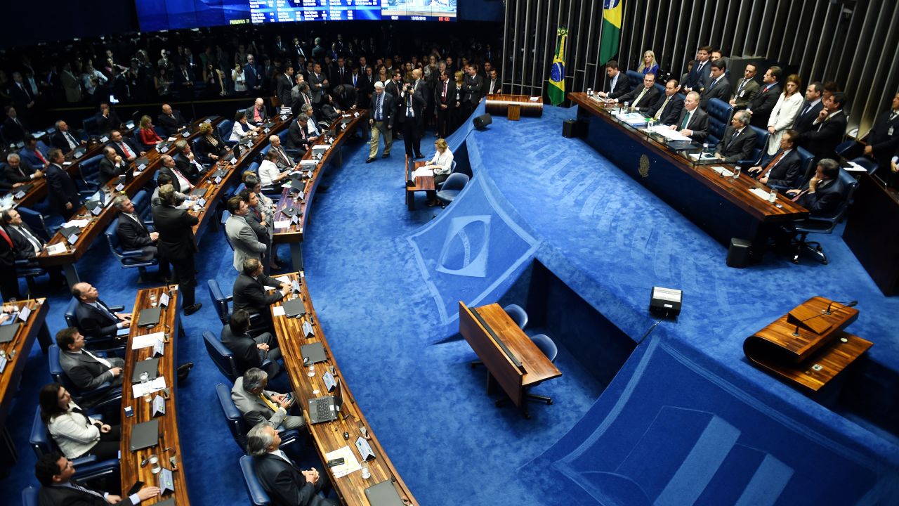 The final score of a Senate vote with an overwhelming 55-22 on suspending Brasilian President Dilma Rousseff and launching an impeachment trial is pictured on a large screen inside the Senate in Brasilia on May 12, 2016.
Brazilian President Dilma Rousseff was suspended on May 12 to face impeachment, ceding power to her vice-president-turned-enemy Michel Temer in a political earthquake ending 13 years of leftist rule over Latin America's biggest nation. / AFP / EVARISTO SA