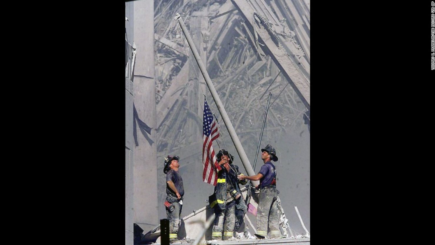 CNNE 313516 - 130903164236-ap-restricted-firefighter-the-flag-horizontal-large-gallery