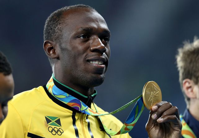 Bolt y la medalla dorada de los 200m en Río 2016.