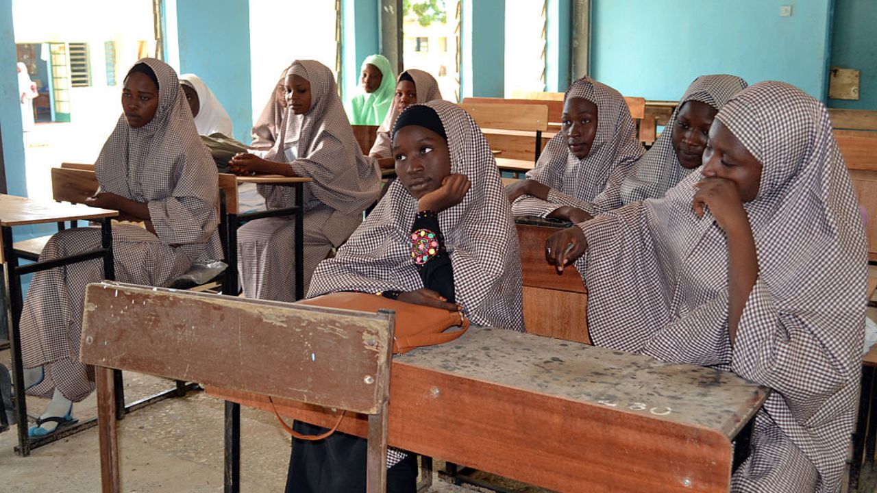 Female students of government college listen to a lecture in a classroom following the re-opening ceremony of public schools in Maiduguri, northeast Nigeria, on October 10, 2016.
Students from public school in northeast Nigeria, from where more than 200 girls were kidnapped by Boko Haram, have resumed lessons, more than two years after the mass abduction. Chibok became synonymous with the Boko Haram conflict when fighters abducted 276 girls from the Government Secondary School (GSS) on the evening of April 14, 2014, sparking global outrage. / AFP / STRINGER