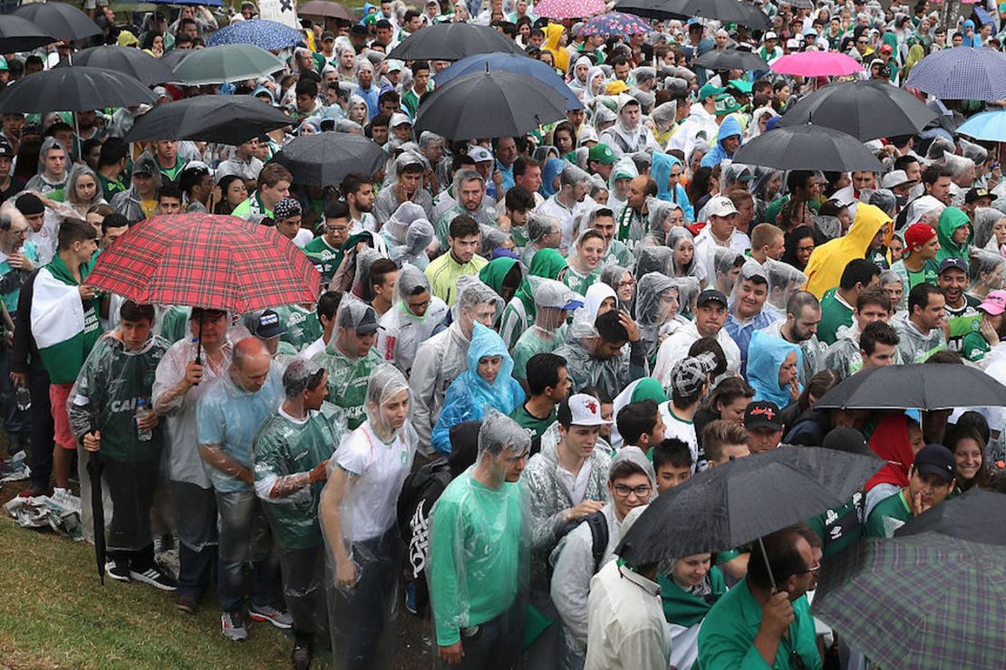 CHAPECO, BRAZIL - DECEMBER 03:  Fans come to the wake to pay tribute to the players of Brazilian team Chapecoense Real at the club's Arena Conda stadium on December 03, 2016 in Chapeco, in the southern Brazilian state of Santa Catarina.The players were killed in a plane accident in the Colombian mountains. Players of the Chapecoense team were among the 77 people on board the doomed flight that crashed into mountains in northwestern Colombia. Officials said just six people were thought to have survived, including three of the players. Chapecoense had risen from obscurity to make it to the Copa Sudamericana finals scheduled for Wednesday against Atletico Nacional of Colombia.