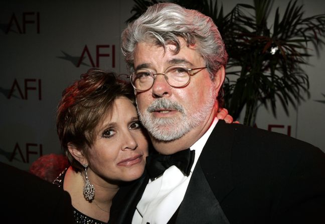 Carrie Fisher y el director George Lucas, creador de la saga de Star Wars.