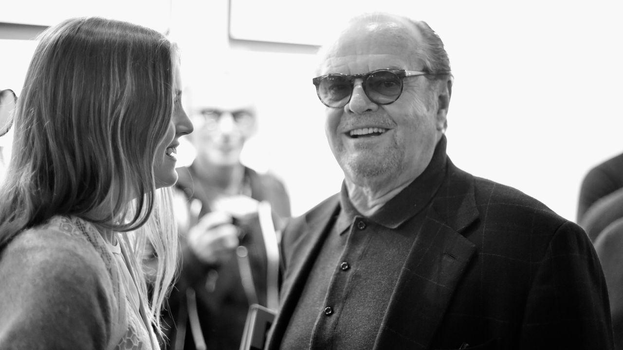 LOS ANGELES, CA - DECEMBER 13:  (EDITORS NOTE: Image was shot in black and white. Color version not available.) Actors Lorraine Nicholson (L) and Jack Nicholson attend TASCHEN And David Bailey Celebrate "It's Just A Shot Away: The Rolling Stones In Photographs" at the TASCHEN Gallery on December 13, 2014 in Los Angeles, California.