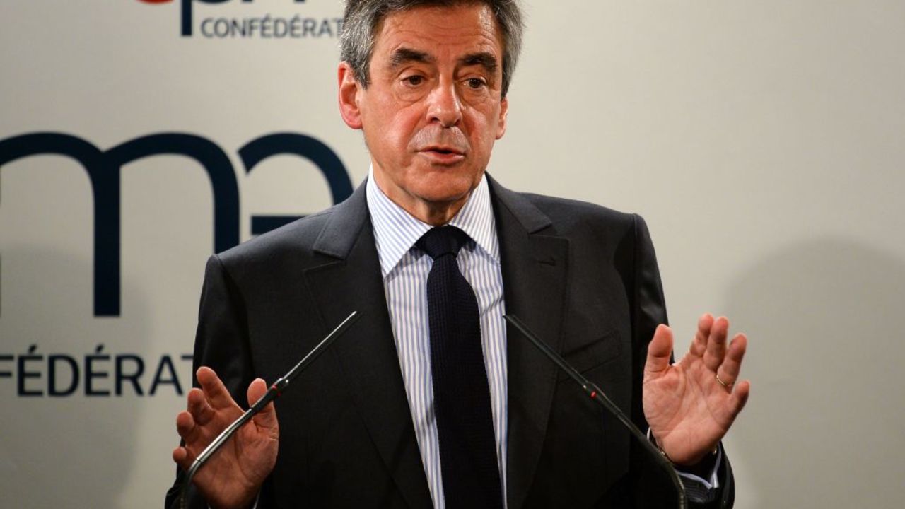 French presidential election candidate for the right-wing Les Republicains (LR) party Francois Fillon speaks during a debate at the French Confederation of Small and Medium-Sized Enterprises (CPME) union's headquarters in Puteaux, west of Paris, on March 6, 2017. / AFP PHOTO / ERIC PIERMONT