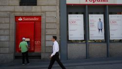 CNNE 418025 - santander buys struggling spanish bank popular for 1 euro