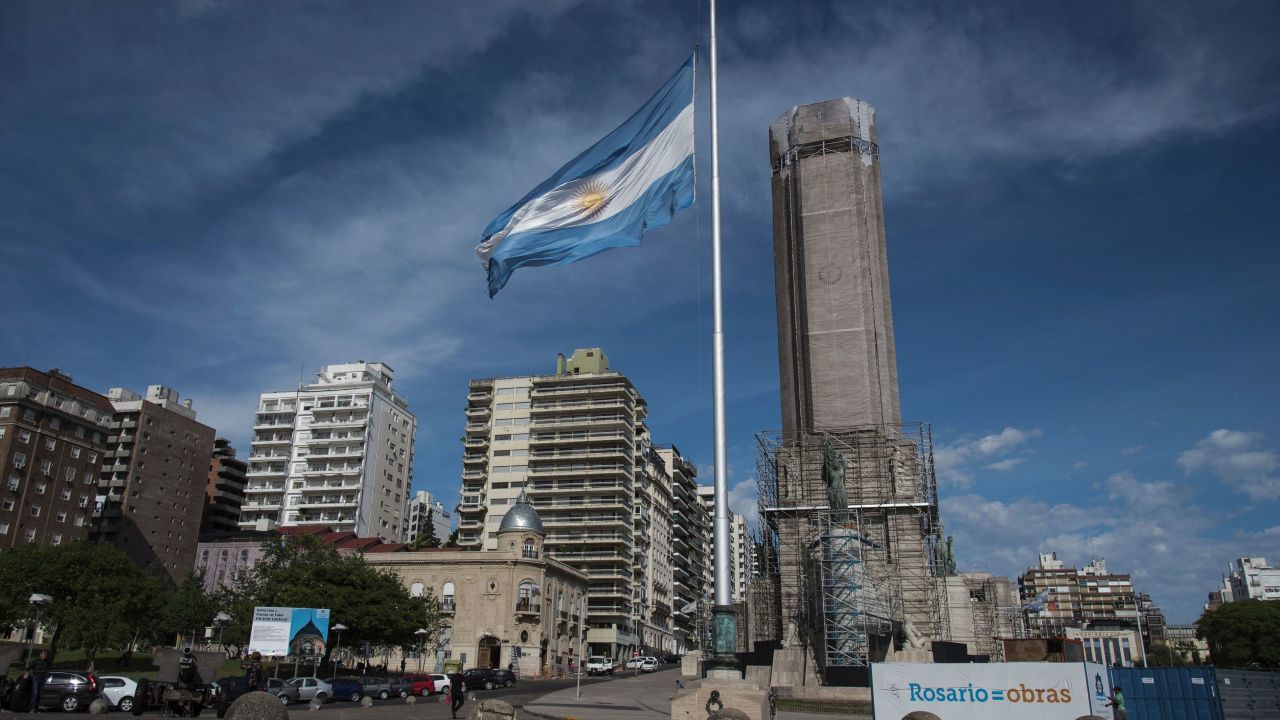 Argentine flag flies at half-mast in Rosario, some 350 Km north-west of Buenos Aires, Argentina on November 1, 2017 as a sign of mourning for the five Argentines dead, inhabitants of this city, during a terrorist attack in New York on October 31.
Five Argentine citizens were killed and another injured Tuesday in the New York truck attack that killed a total of eight people. Eleven others were seriously hurt when the truck driver struck in broad daylight just blocks from the 9/11 Memorial, on the West Side of Lower Manhattan, close to schools as children and their parents geared up to celebrate Halloween. / AFP PHOTO / STRINGER