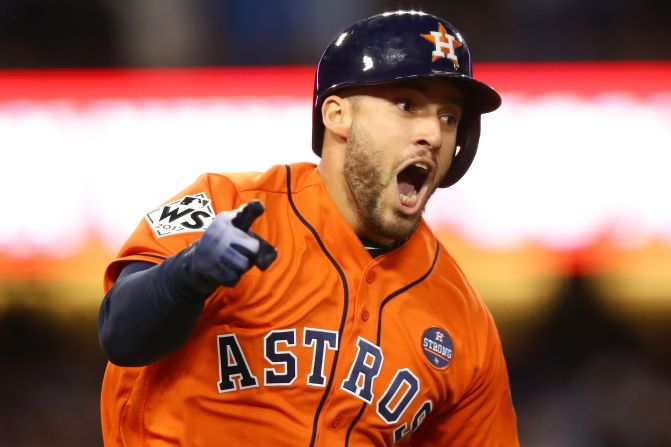 George Springer celebra con sus compañeros después de conectar un jonrón de dos carreras durante la segunda entrada contra los Dodgers de Los Angeles en el séptimo juego de la Serie Mundial 2017 (Ezra Shaw/Getty Images).