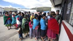 People queue outside a polling station set at a school in the Ecuadorean town of Cangahua, northeast of Quito, to cast their votes during a referendum called by President Lenin Moreno, on February 4, 2018.
Ecuadoreans decide the political fate of former president Rafael Correa Sunday in a referendum called by his successor turned staunched opponent and expected to prevent him from returning to power.  / AFP PHOTO / Juan RuizJUAN RUIZ/AFP/Getty Images