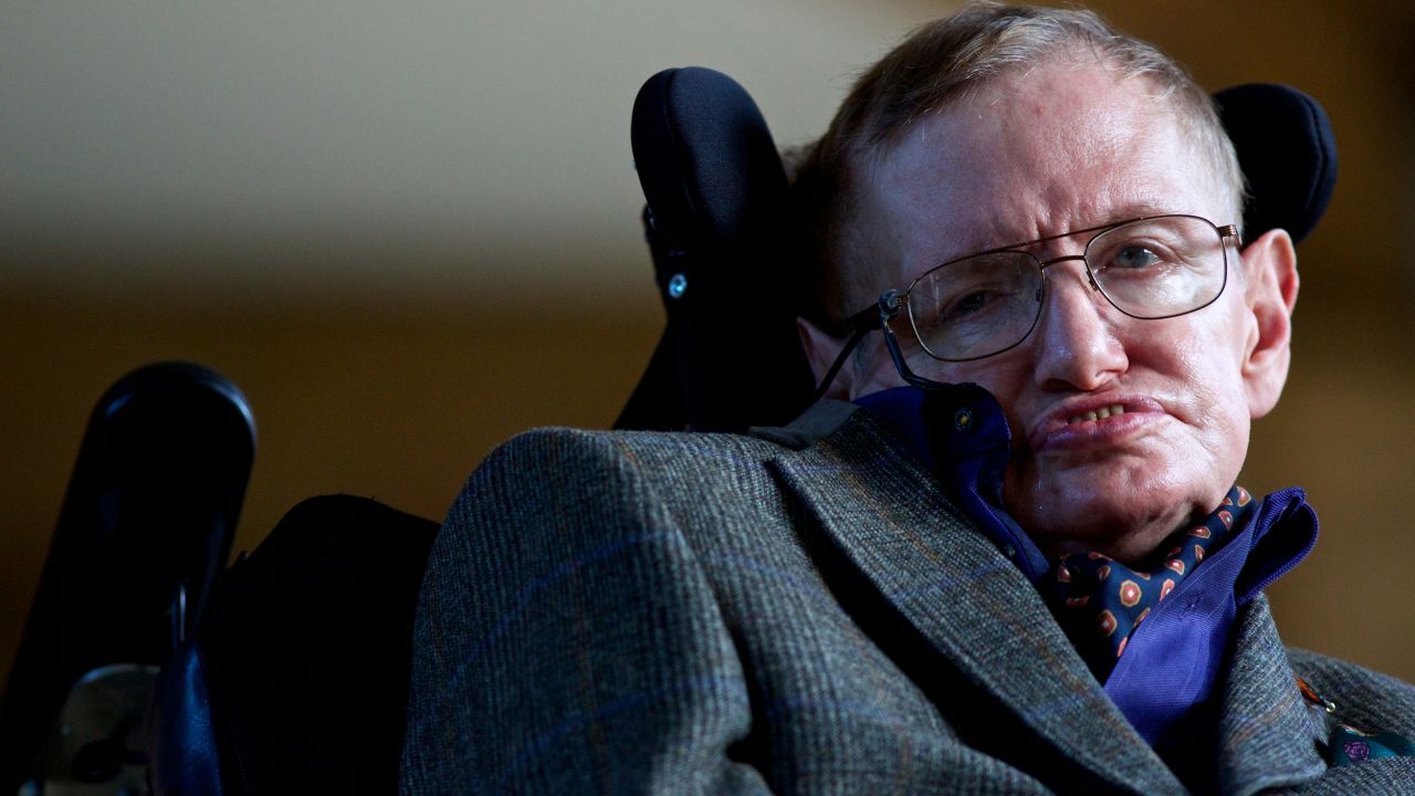 Theoretical physicist Stephen Hawking poses for a picture ahead of a gala screening of the documentary 'Hawking', a film about the scientist's life, at the opening night of the Cambridge Film Festival in Cambridge, eastern England on September 19, 2013. Hawking tells the extraordinary tale of how he overcame severe disability to become the most famous living scientist in a new documentary film premiered in Britain.  AFP PHOTO / ANDREW COWIE