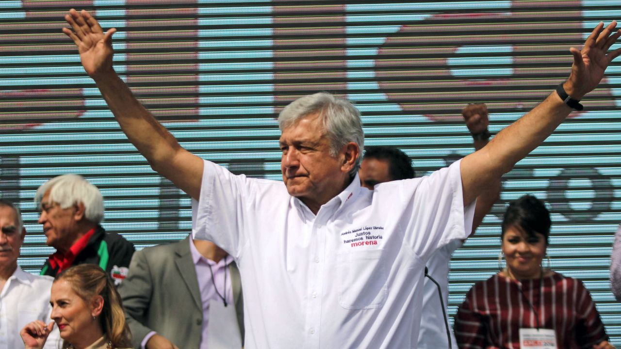 Mexico's presidential candidate Andres Manuel Lopez Obrador, standing for MORENA party, cheers at his supporters during his first campaign rally, in Ciudad Juarez, Chihuahua State, Mexico, on April 1, 2018.
The campaign for Mexico's July 1 presidential election officially opened on March 30. / AFP PHOTO / HERIKA MARTINEZ