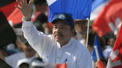 Nicaraguan President Daniel Ortega waves to supporters, as he arrives to take part in the commemoration of the 39th Anniversary of the Sandinista Revolution at "La Fe" square in Managua on July 19, 2018. - Nicaragua on Thursday marked the anniversary of its leftwing Sandinista revolution victory 39 years ago -- but the commemorations were overshadowed by President Daniel Ortega's deadly crackdown on opponents calling for his ouster. (Photo by MARVIN RECINOS / AFP)