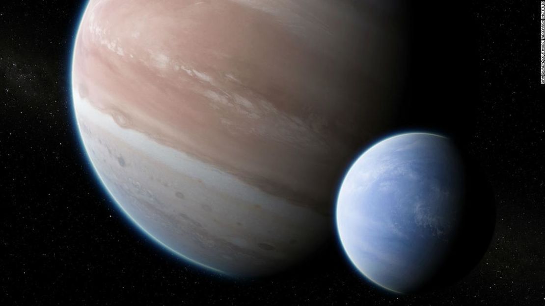 Esta es una ilustración artística de cómo se vería una luna del tamaño de Neptuno en órbita al exoplaneta gigante Kepler-1625b, en un sistema estelar a 8.000 años luz de la Tierra. Podría ser la primera exoluna que se haya descubierto.