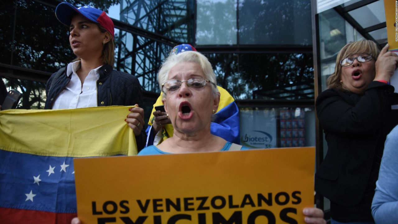 CNNE 608547 - venezolanos en ee-uu- se unen a la marcha de la oposicion