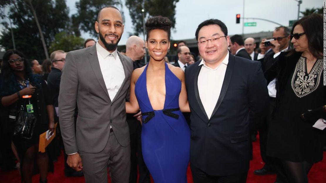 Jho Low asiste a los Grammy Awards 2014 junto con el productor Swizz Beatz y la música Alicia Keys. Low era presidente de EMI Music Publishing Asia en ese momento.