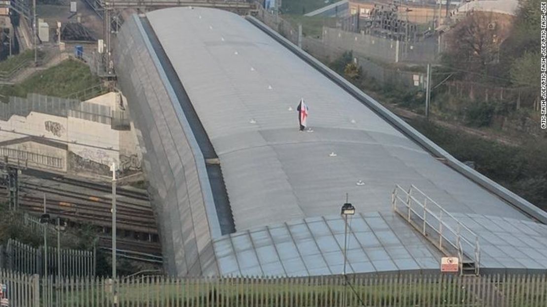 DON'T USE AWAITING APPROVAL Alleged picture of protester above the tracks at St Pancras in London, accused of halting Eurostar