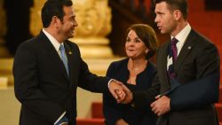 Guatemalan President Jimmy Morales(L) shakes hands with US Acting Secretary of Homeland Security Kevin McAleenan (R) after signing a cooperation agreement at Culture Palace in Guatemala City on May 27, 2019. (Photo by Johan ORDONEZ / AFP)