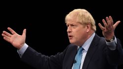 Britain's Prime Minister Boris Johnson delivers his keynote speech to delegates on the final day of the annual Conservative Party conference at the Manchester Central convention complex, in Manchester, north-west England on October 2, 2019. - Prime Minister Boris Johnson was set to unveil his plan for a new Brexit deal at his Conservative party conference Wednesday, warning the EU it is that or Britain leaves with no agreement this month. Downing Street said Johnson would give details of a "fair and reasonable compromise" in his closing address to the gathering in Manchester, and would table the plans in Brussels the same day. (Photo by Oli SCARFF / AFP)