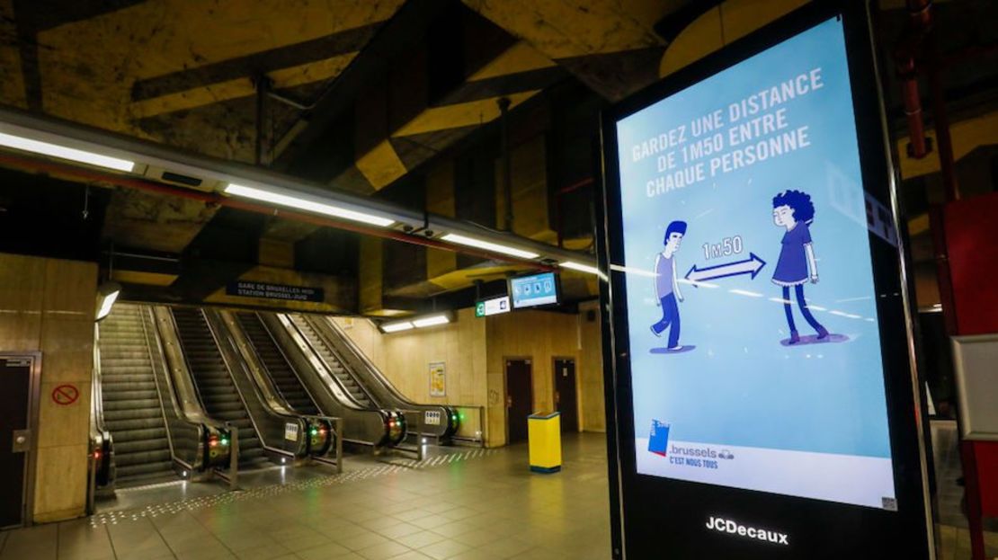 Illustration picture shows a digital panel asking to keep social distance, in a metro station, Brussels, Monday 30 March 2020. The measures announced on March 18th by the National Security Council to avoid the spread of the Covid-19 will remain two weeks longer untill April 19th. BELGA PHOTO THIERRY ROGE