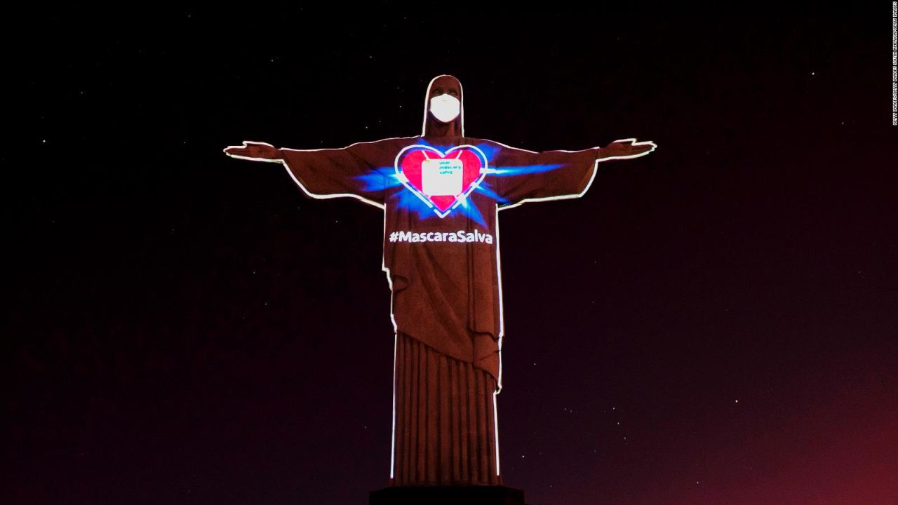 CNNE 822345 - mira al cristo redentor de rio con mascarilla