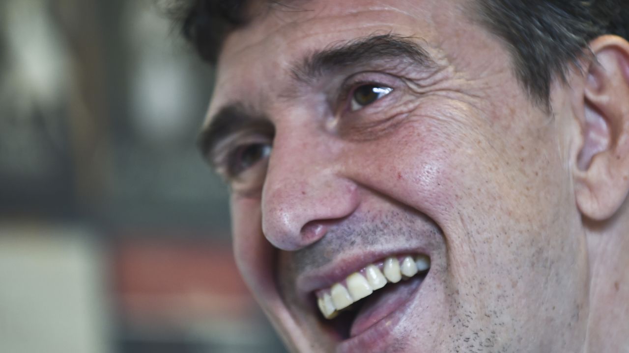 Uruguay's National Ballet Company director, Argentinian Julio Bocca, smiles as he speaks during an interview with AFP in Montevideo on November 9, 2015. Uruguay's National Ballet Company will present Scottish Kenneth MacMillan's choreography of the Romeo and Juliet ballet on the year of the company's 80th anniversary. AFP PHOTO / PABLO PORCIUNCULA / AFP / PABLO PORCIUNCULA