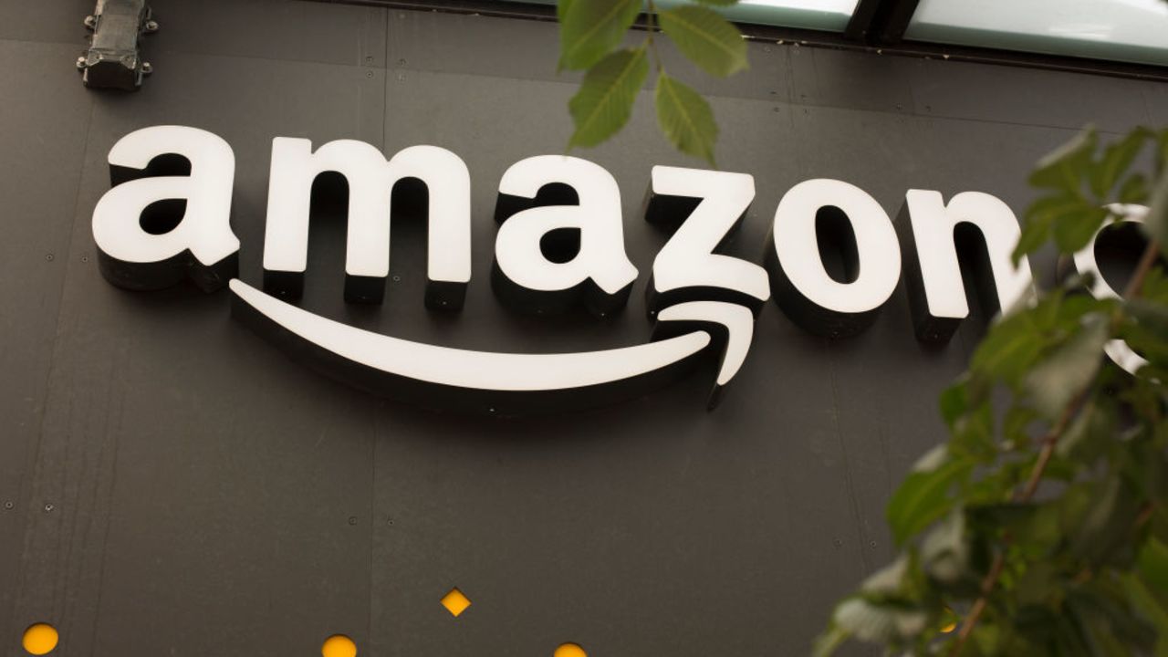 SEATTLE, WA - JUNE 16: A portion of the sign advertising Amazon Go is seen outside the grocery store's location on June 16, 2017 in Seattle, Washington. Amazon announced that it will buy Whole Foods Market, Inc. for over $13 billion dollars.