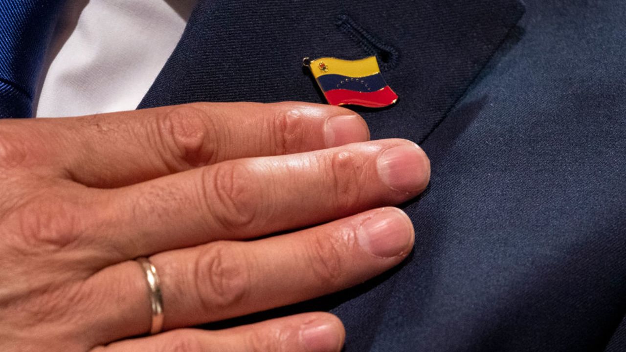 MADRID, SPAIN - OCTOBER 27: Venezuela opposition leader Leopoldo López places his hand on his heart next to a pin of Venezuelan flag during a press conference at Circulo de Bellas Artes on October 27, 2020 in Madrid, Spain. Leopoldo López left the Spanish embassy in Caracas, where he had received shelter for 18 months, and secretly fled Venezuela on his way to Madrid last Sunday.