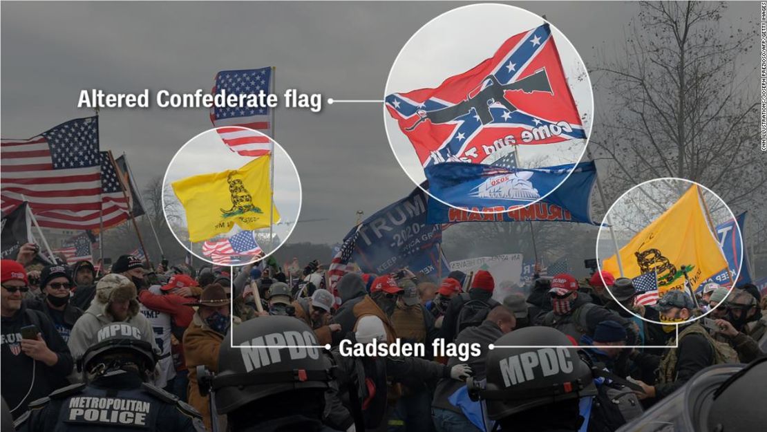 CNNE 937768 - 210108211300-05-capitol-hill-extremist-flags-confederate-dont-tread-jpg-super-169