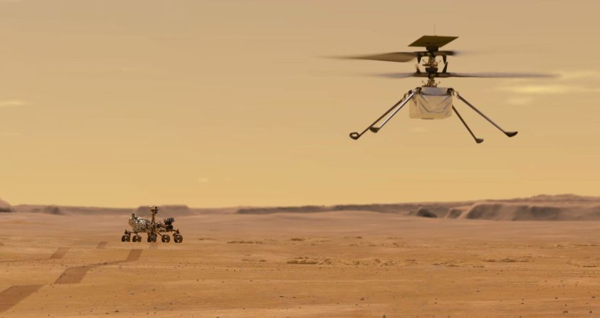 Esta es una ilustración de cómo sería el vuelo del helicóptero Ingenuity en Marte, mientras el Perseverance sigue sus movimientos. La aeronave ya logró confirmar comunicaciones con el rover y con los operadores de vuelo en la Tierra.